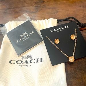 NWT Coach rose gold earrings and necklace